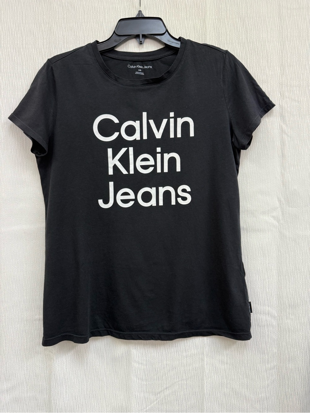Calvin Klein Jeans Black Tee with White Vertical Logo
